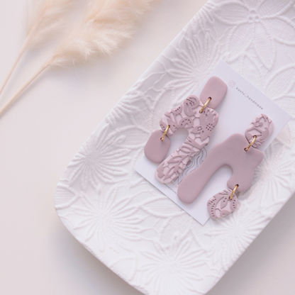 Pendientes Lucy
